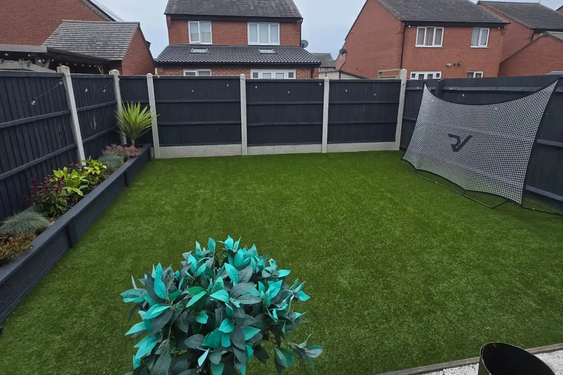 An enclosed garden laid with artificial grass